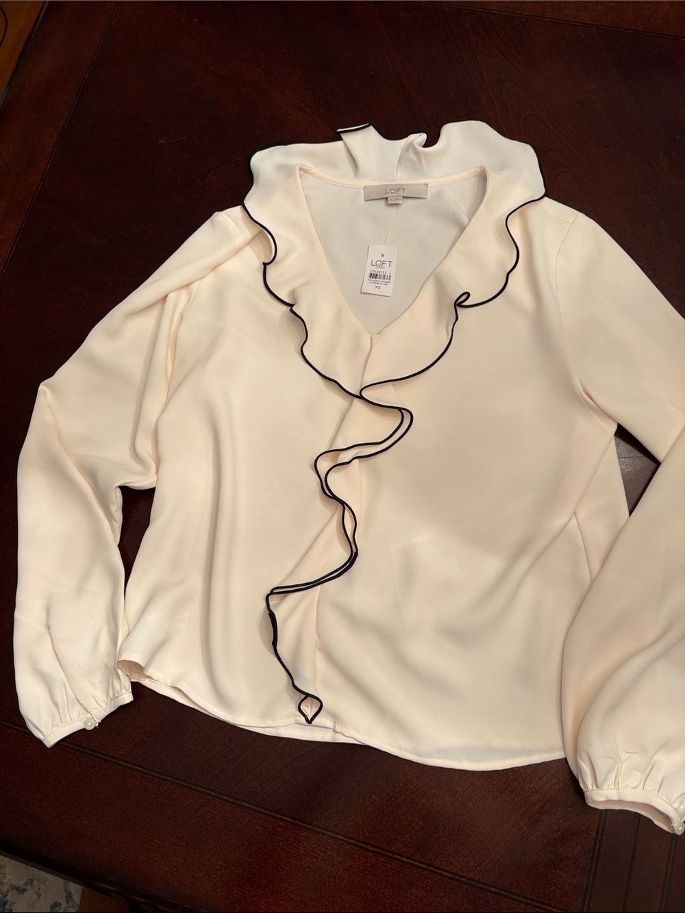 LOFT Cream Blouse with Black Ruffle Trim